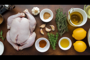 Ingredients for Cinnamon Queen chicken recipe on a rustic kitchen counter." • Title: "Cinnamon Queen Chicken Ingredients